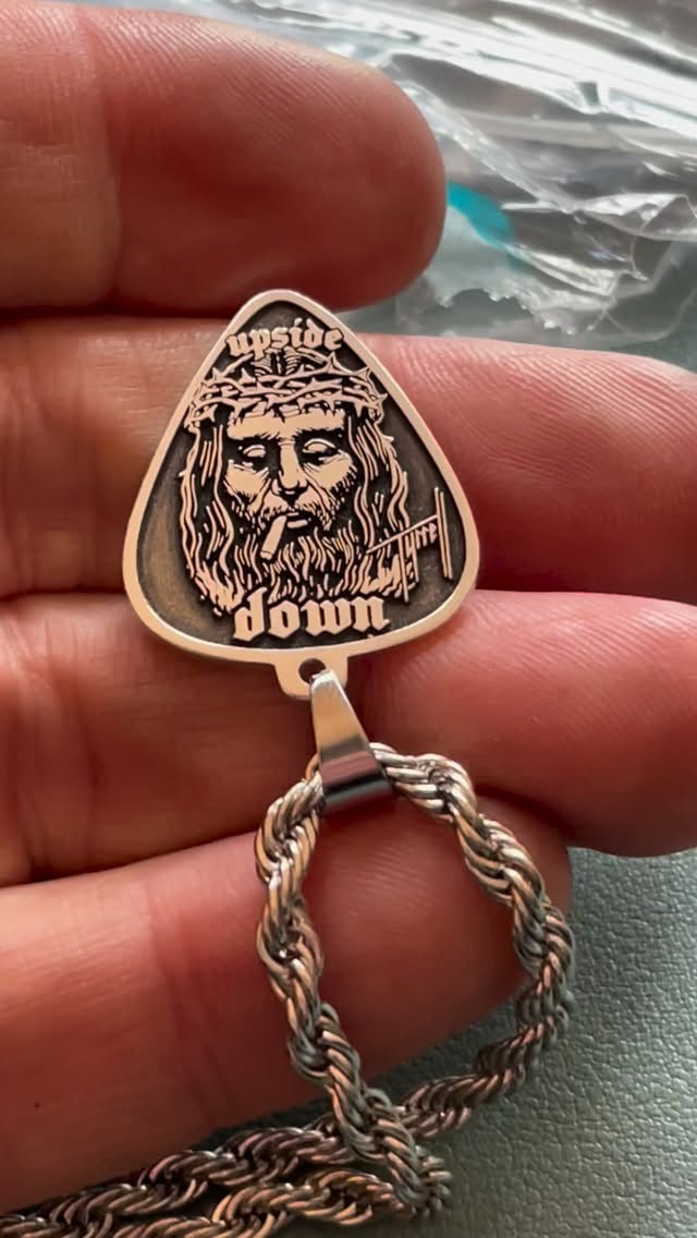 Check it out! Is this f’n cool our what? My friends Richard and Krystine made this pendant from a drawing I did for our 