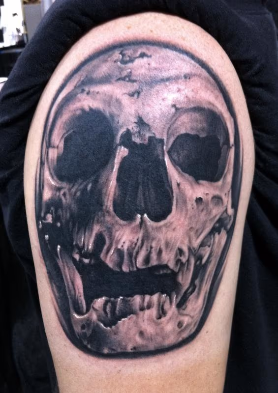Neanderthal skull tattoo