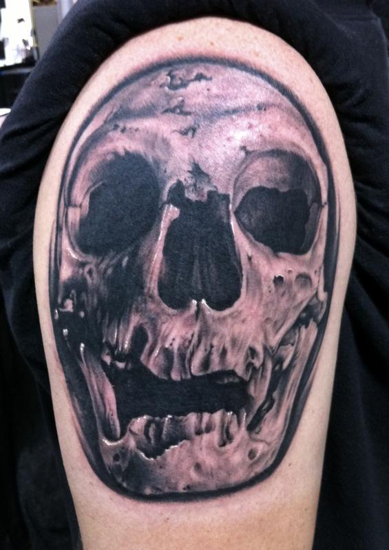 Neanderthal skull tattoo