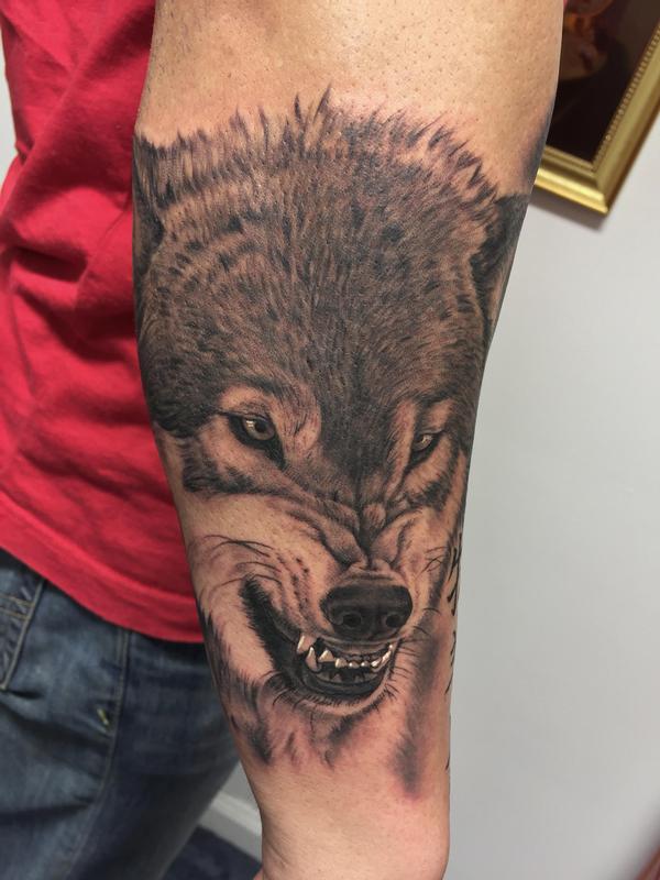 Snarling Wolf Tattoo
