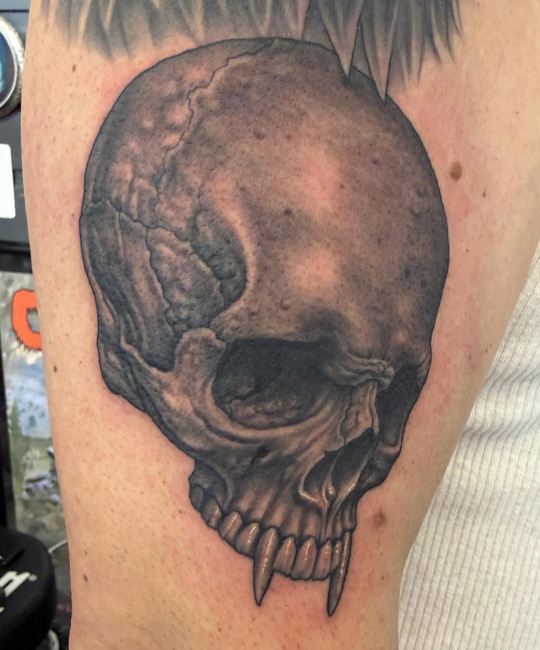 Vampire skull with fangs, upper arm