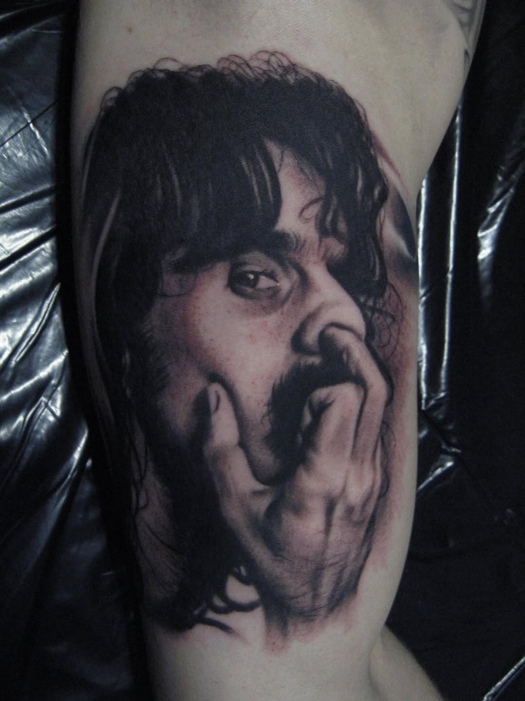 Frank Zappa portrait tattoo, thigh