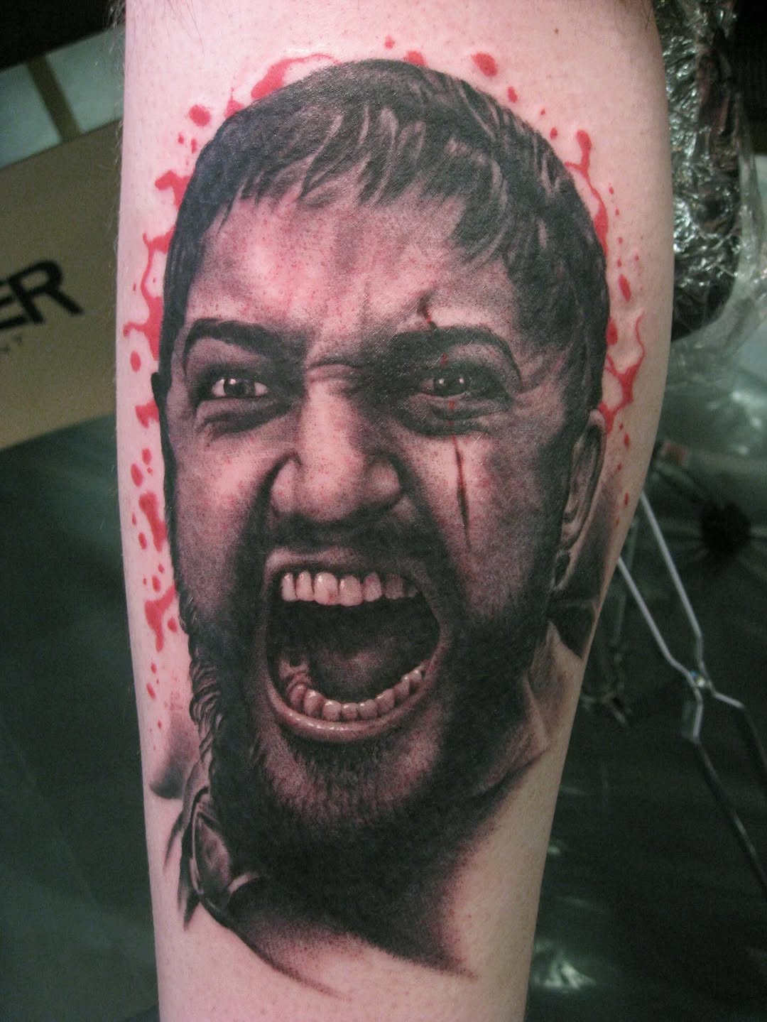 Realistic portrait with red splatter effect, thigh