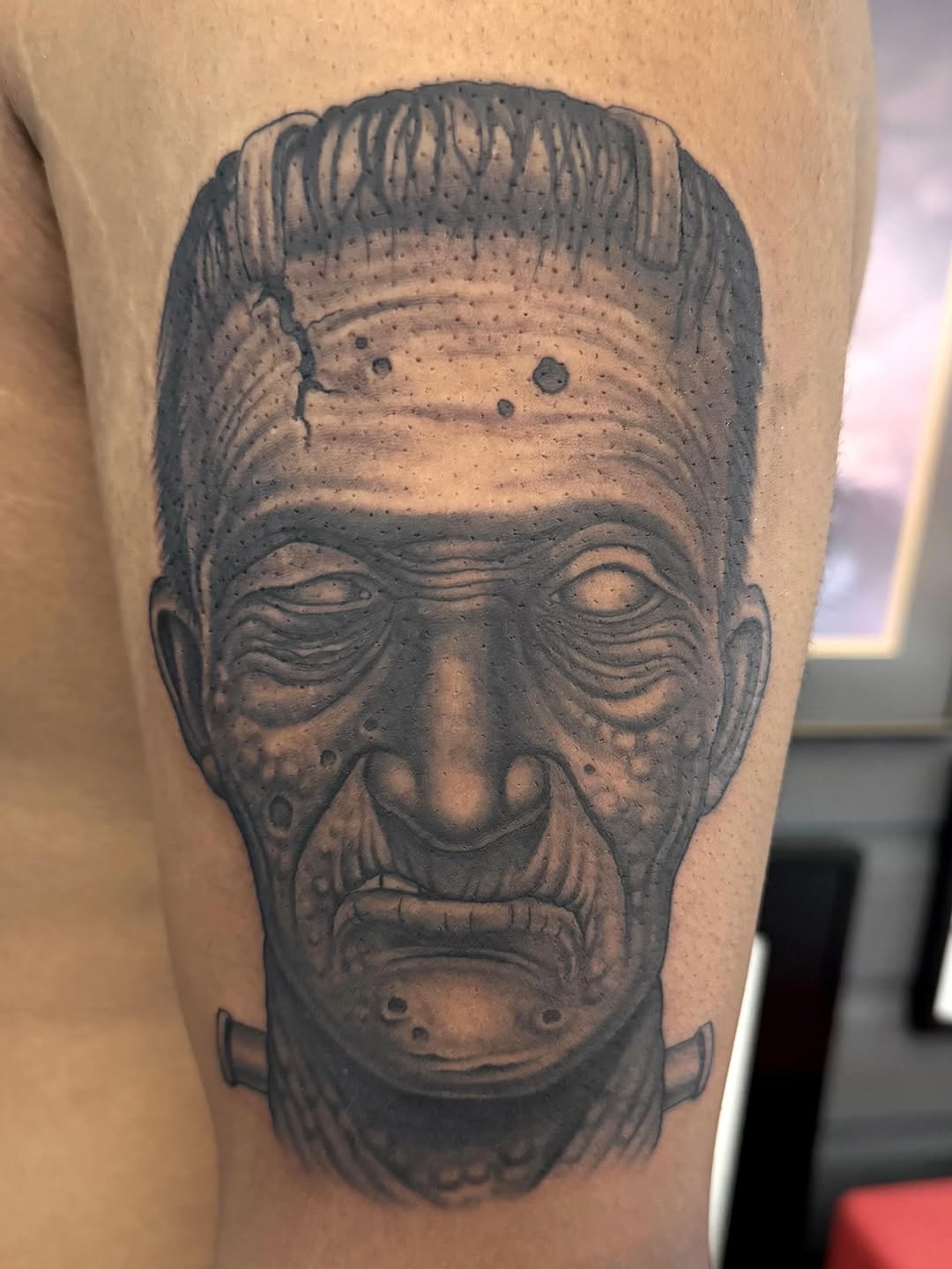 Frankenstein portrait tattoo, thigh