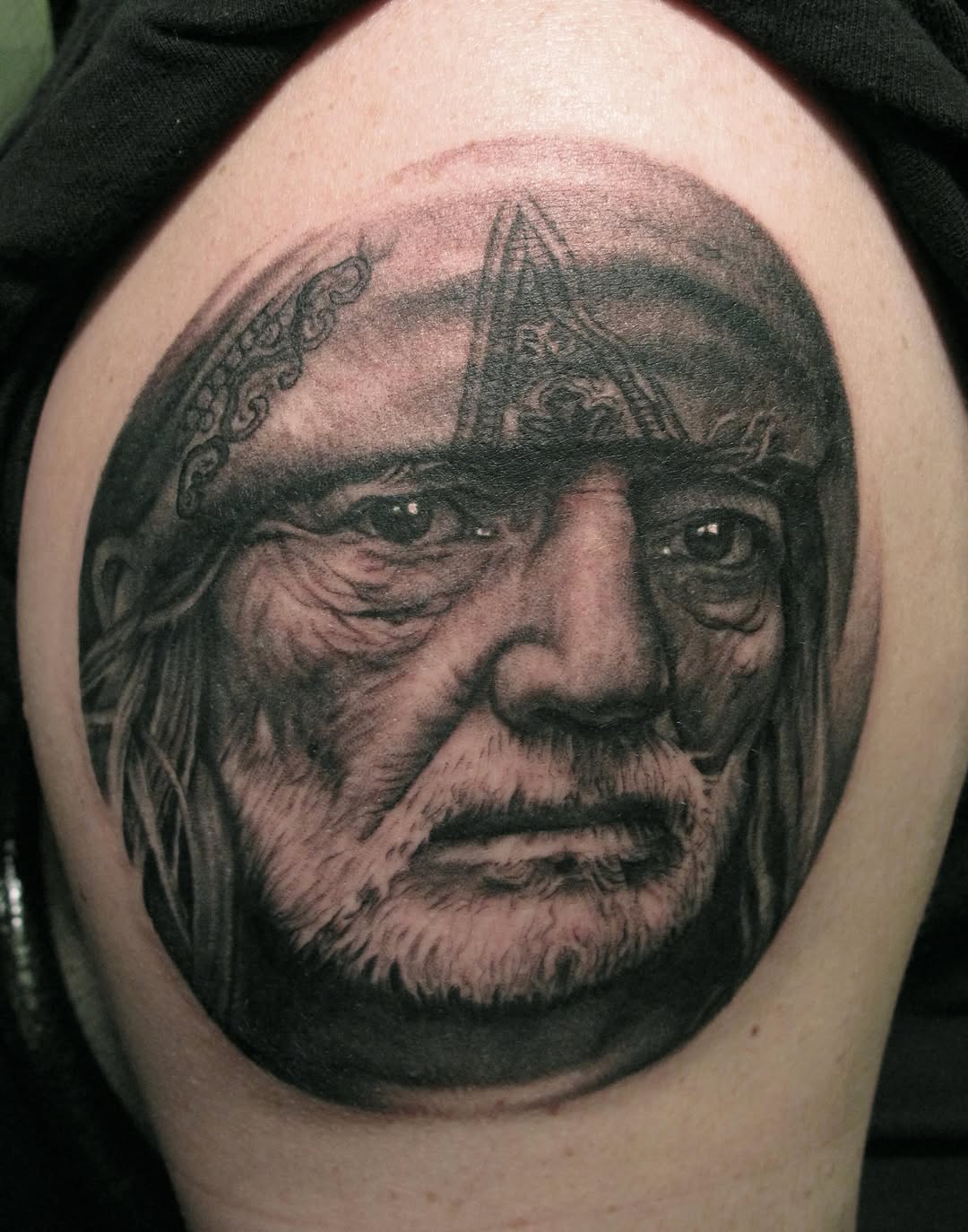 Willie Nelson portrait tattoo, shoulder