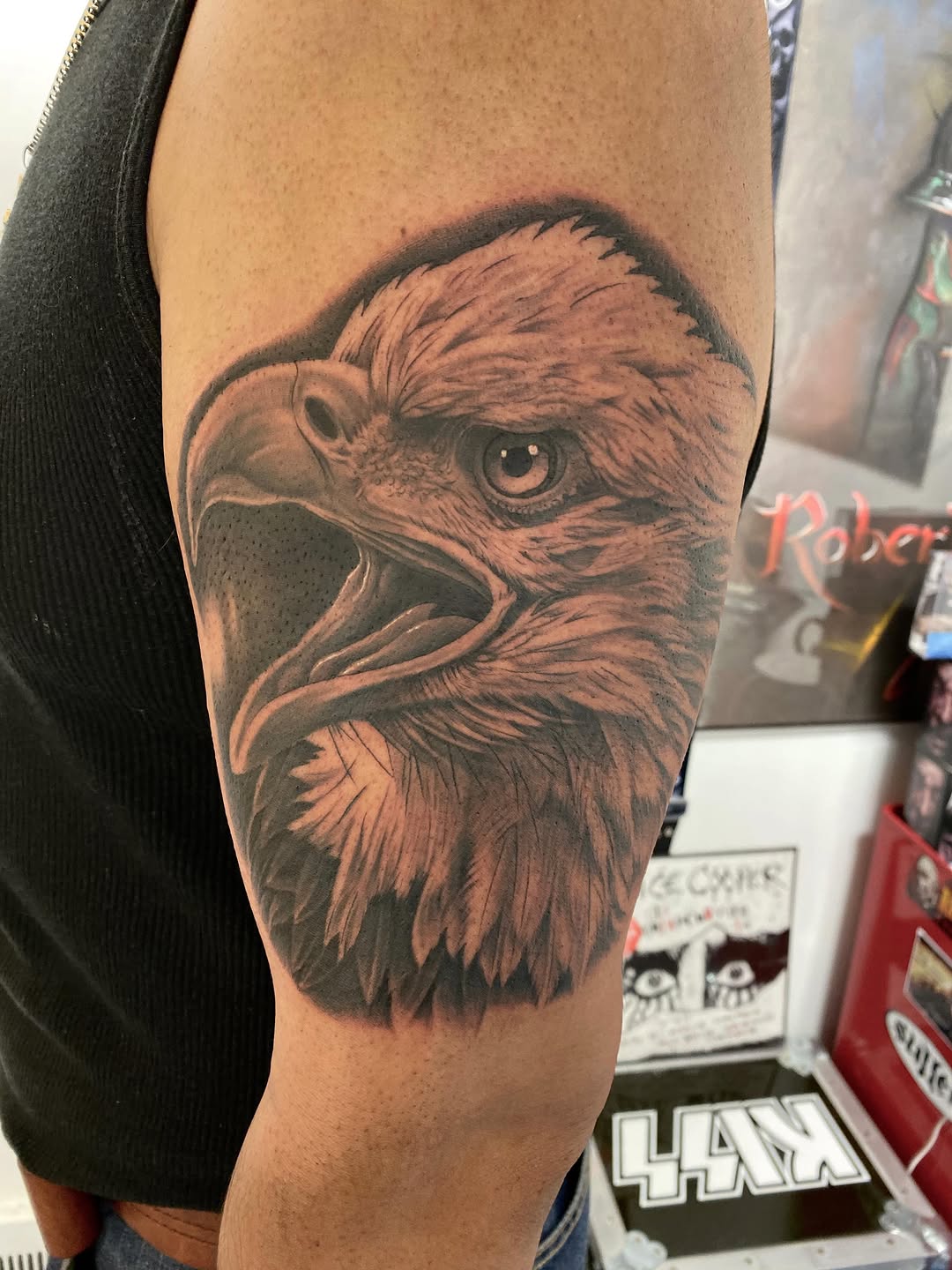 Eagle head portrait tattoo, bicep