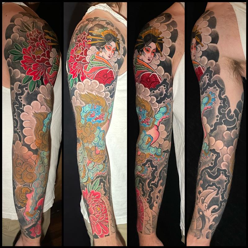 Geisha and foodog sleeve tattoo