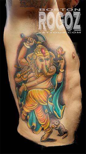 Ganesh rib tattoo