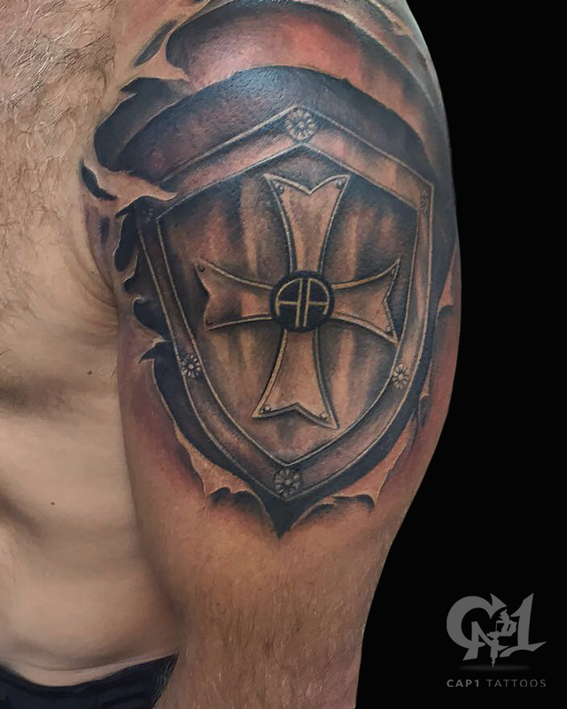 Skin Rip Shield Tattoo