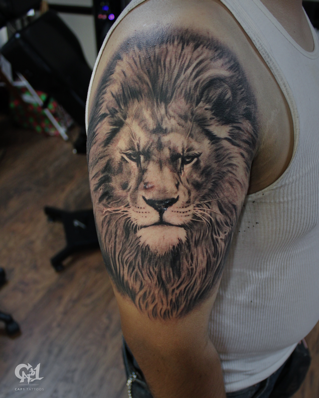 Realistic Lion Tattoo