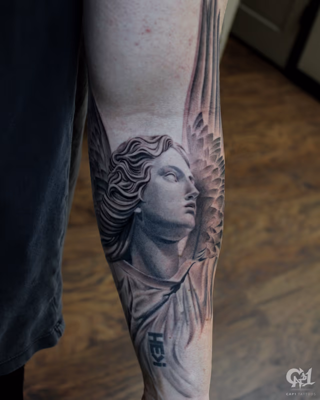 Stone Angel Half Sleeve Tattoo