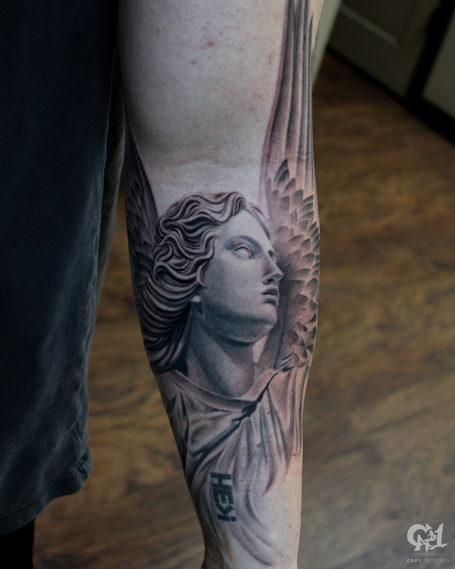 Stone Angel Half Sleeve Tattoo