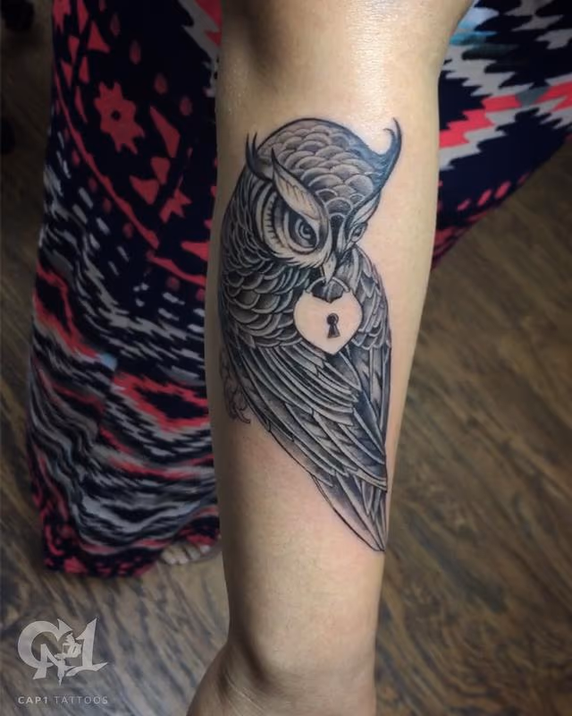 Owl and Locket Arm Tattoo