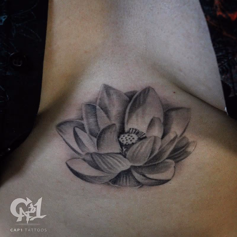 Lotus Flower Sternum Tattoo