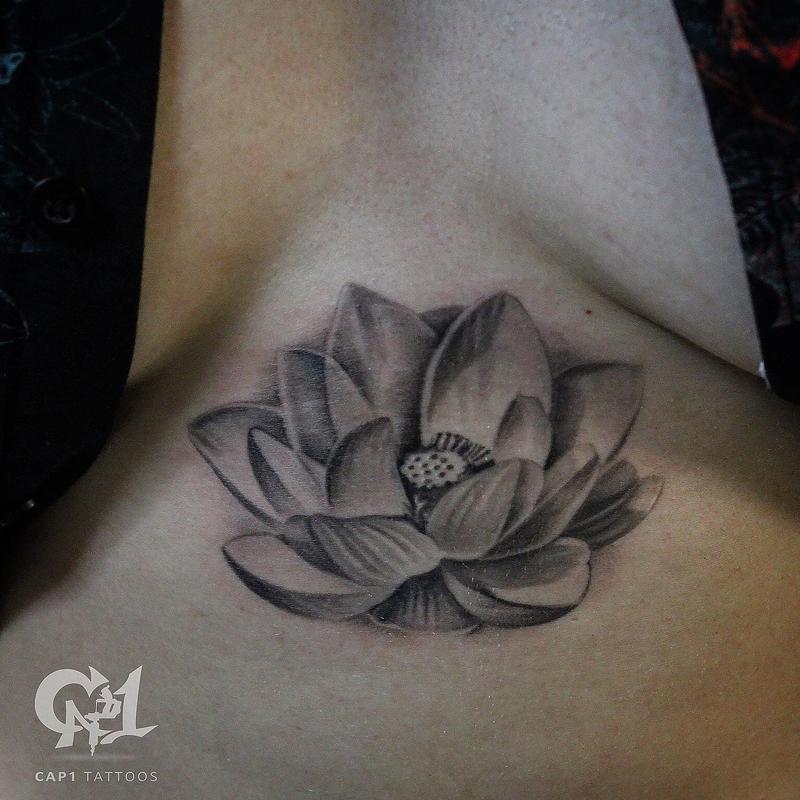 Lotus Flower Sternum Tattoo