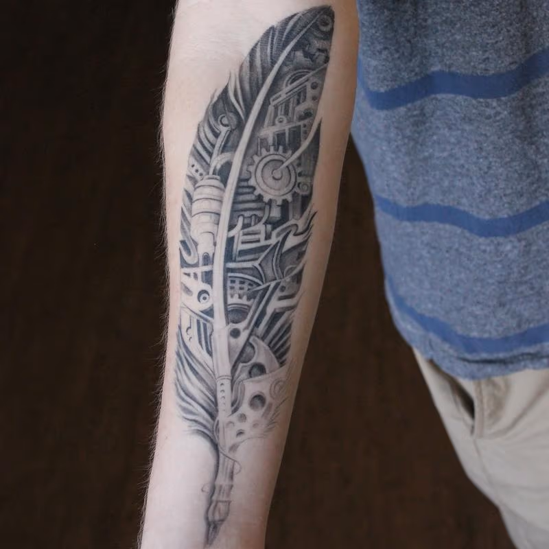 Healed Black and Grey Bio Mechanical Feather on Forearm