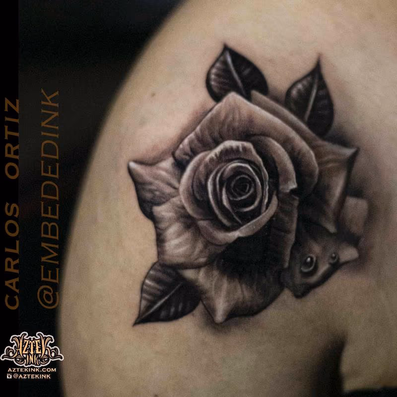 rose tattoo by Carlos ortiz chicago