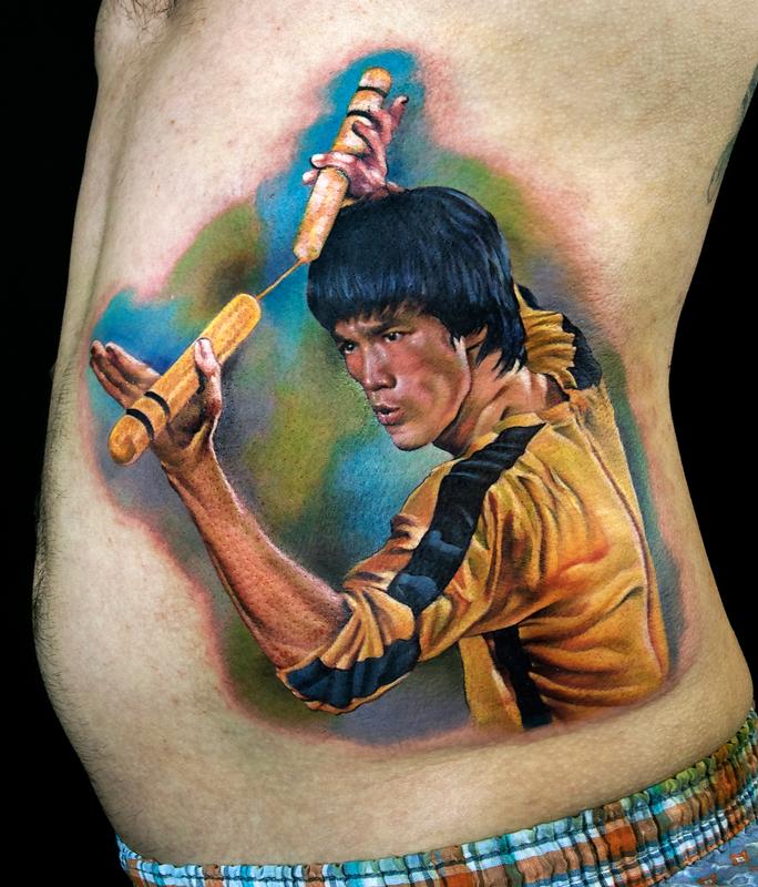 Bruce Lee color portrait tattoo