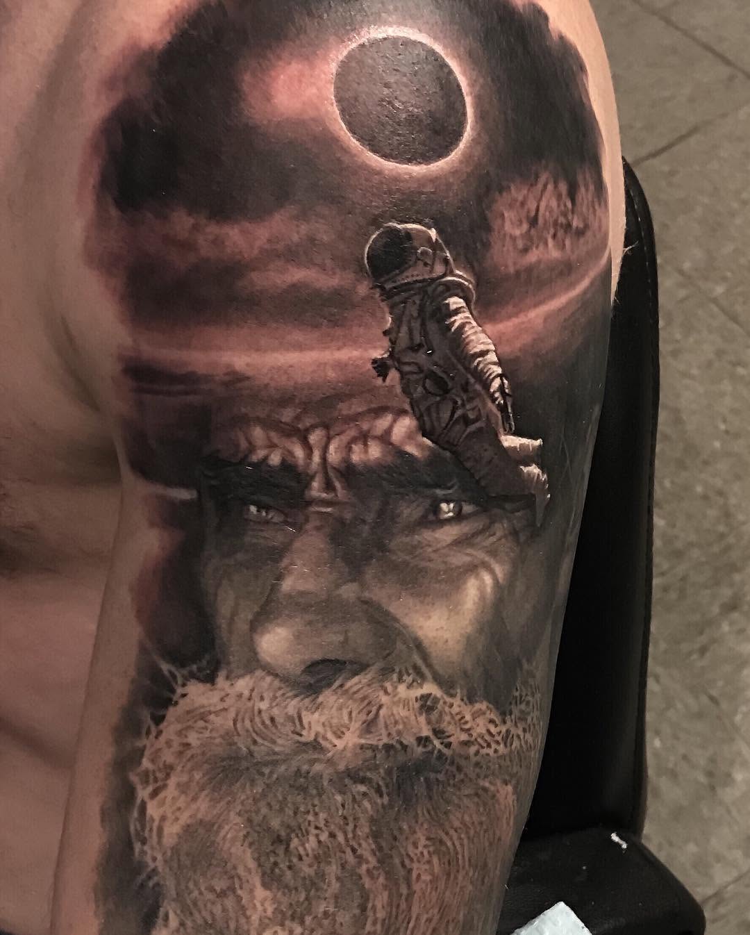 Black-and-grey astronaut and bearded portrait, shoulder