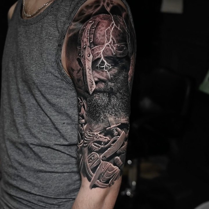 Odin Viking warrior half-sleeve, black-and-grey