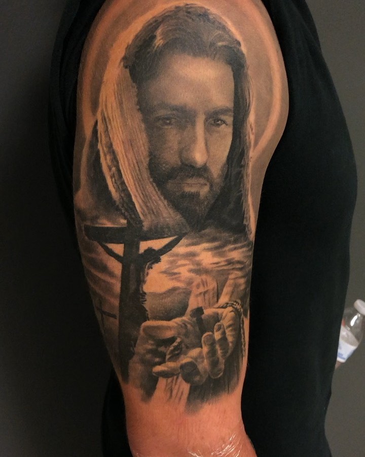 Black-and-grey Jesus portrait, half-sleeve