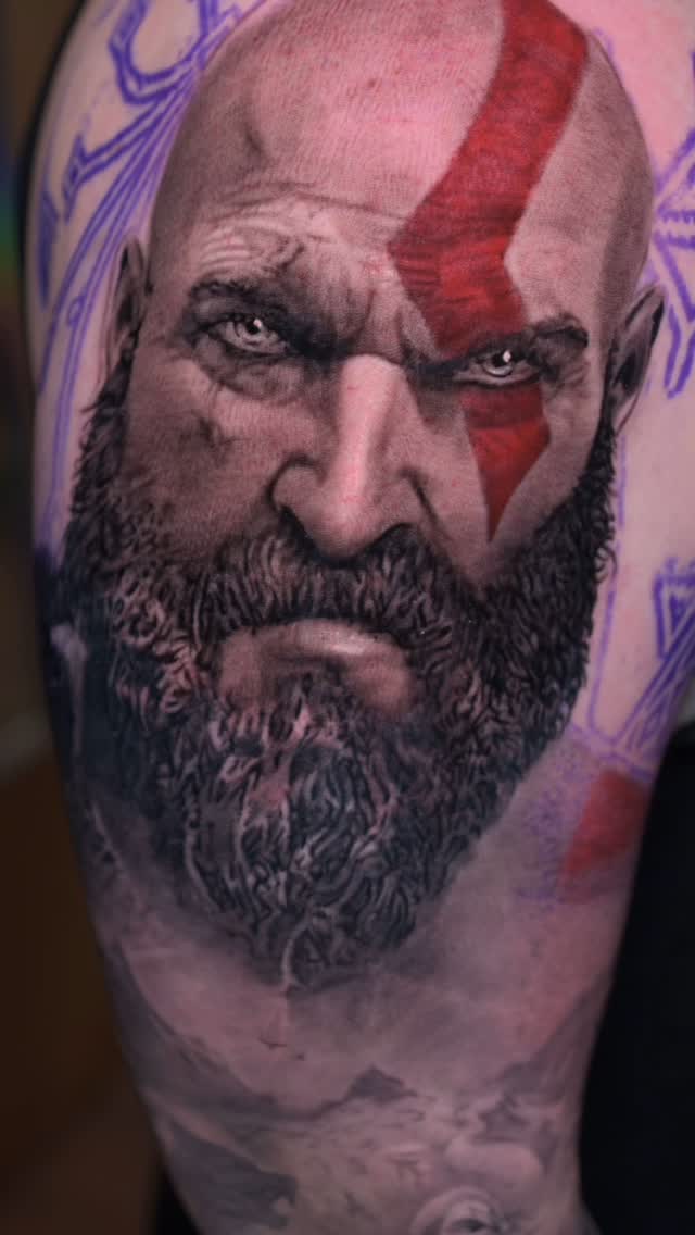 Kratos God of War portrait tattoo, bicep