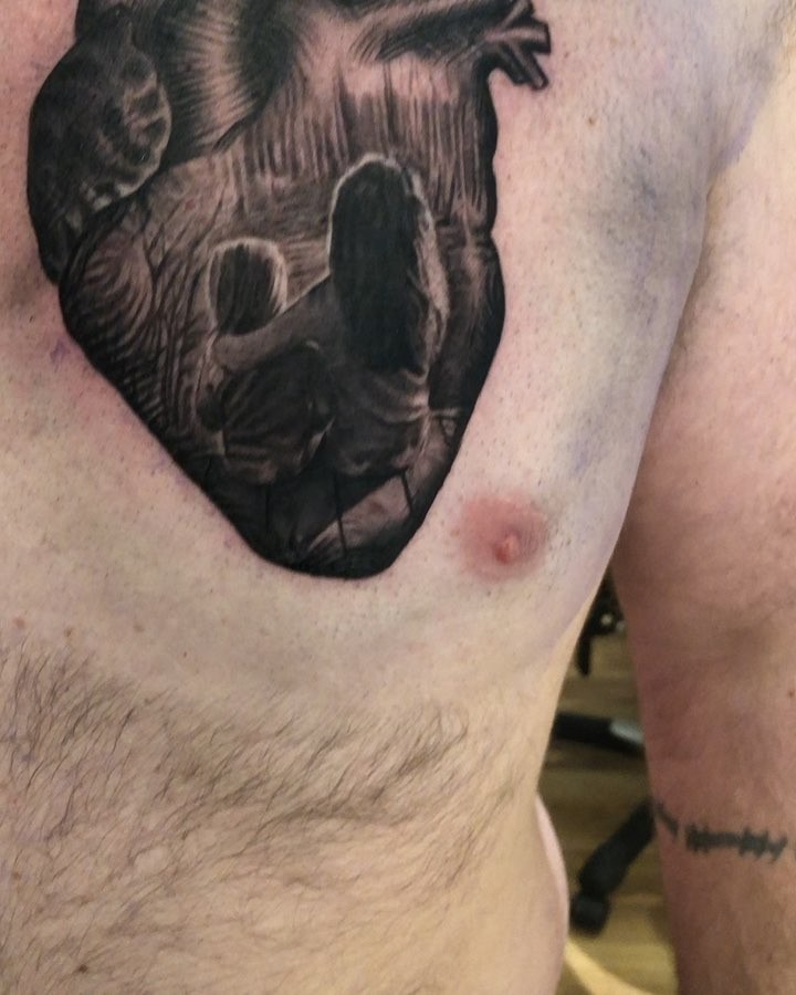 Anatomical heart with family portrait, chest
