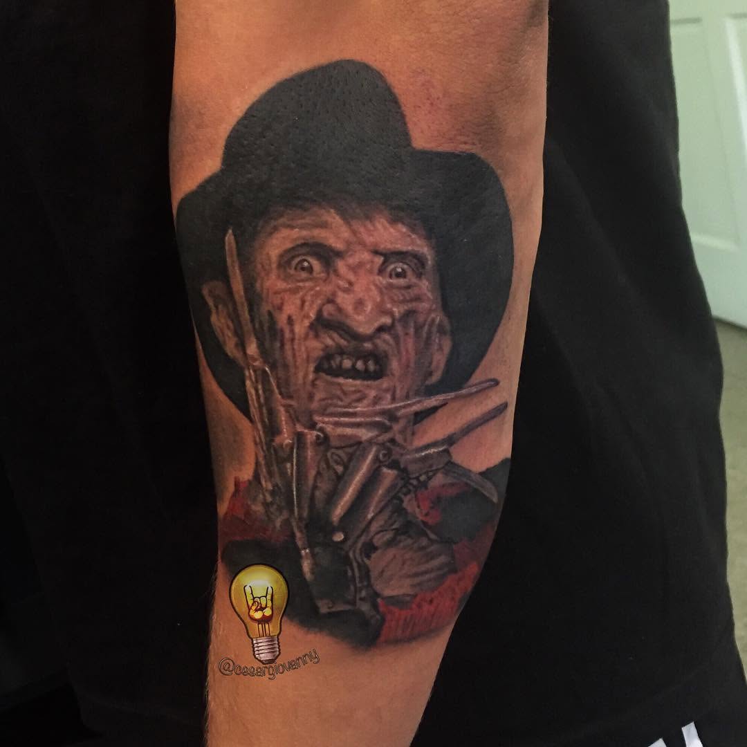Freddy Krueger portrait tattoo on forearm