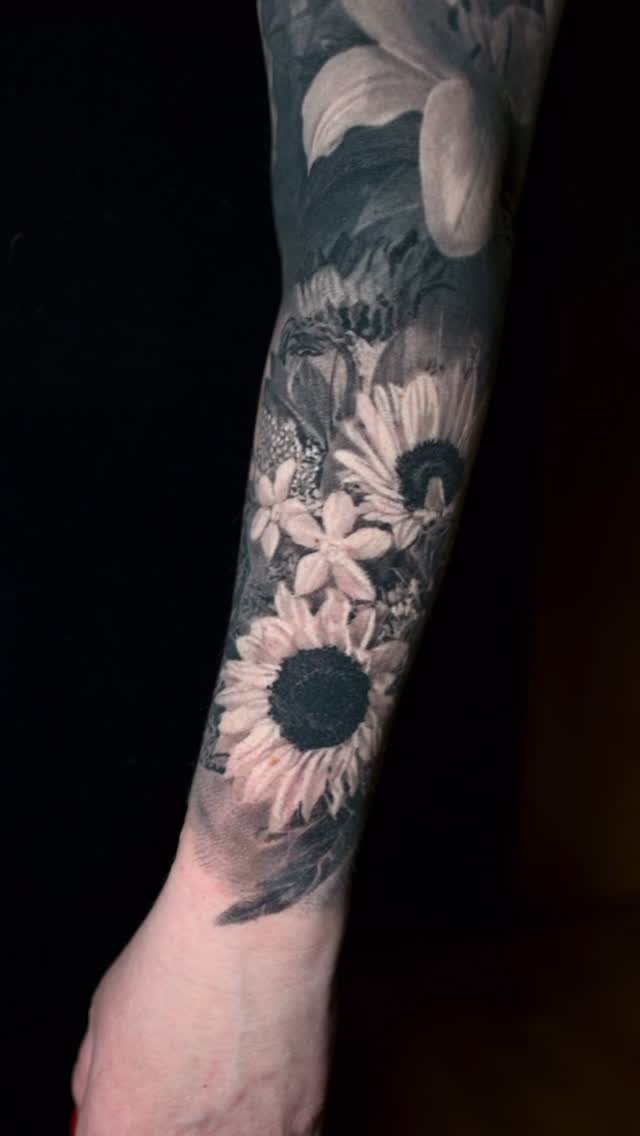 Black-and-grey floral sleeve with sunflowers