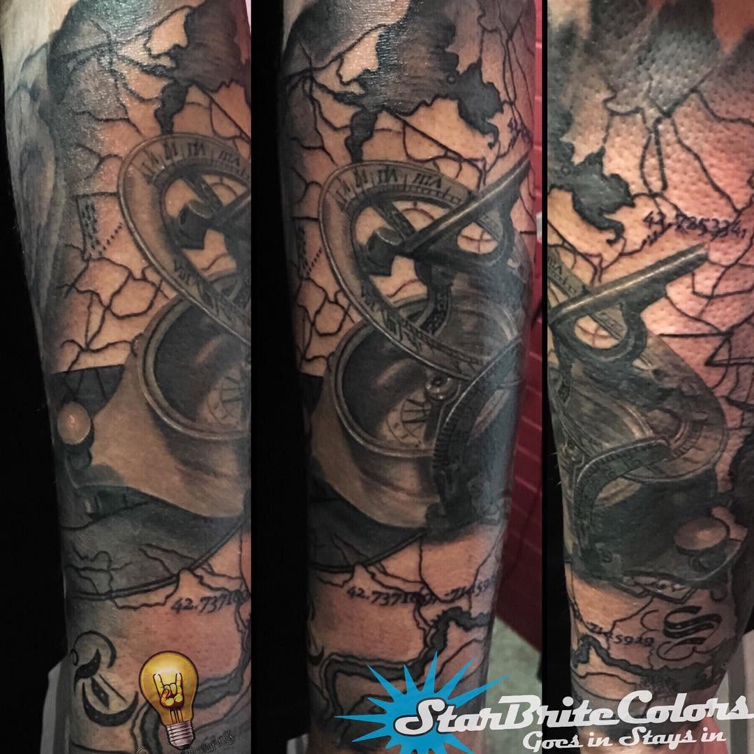 Realistic compass and map sleeve in black-and-grey
