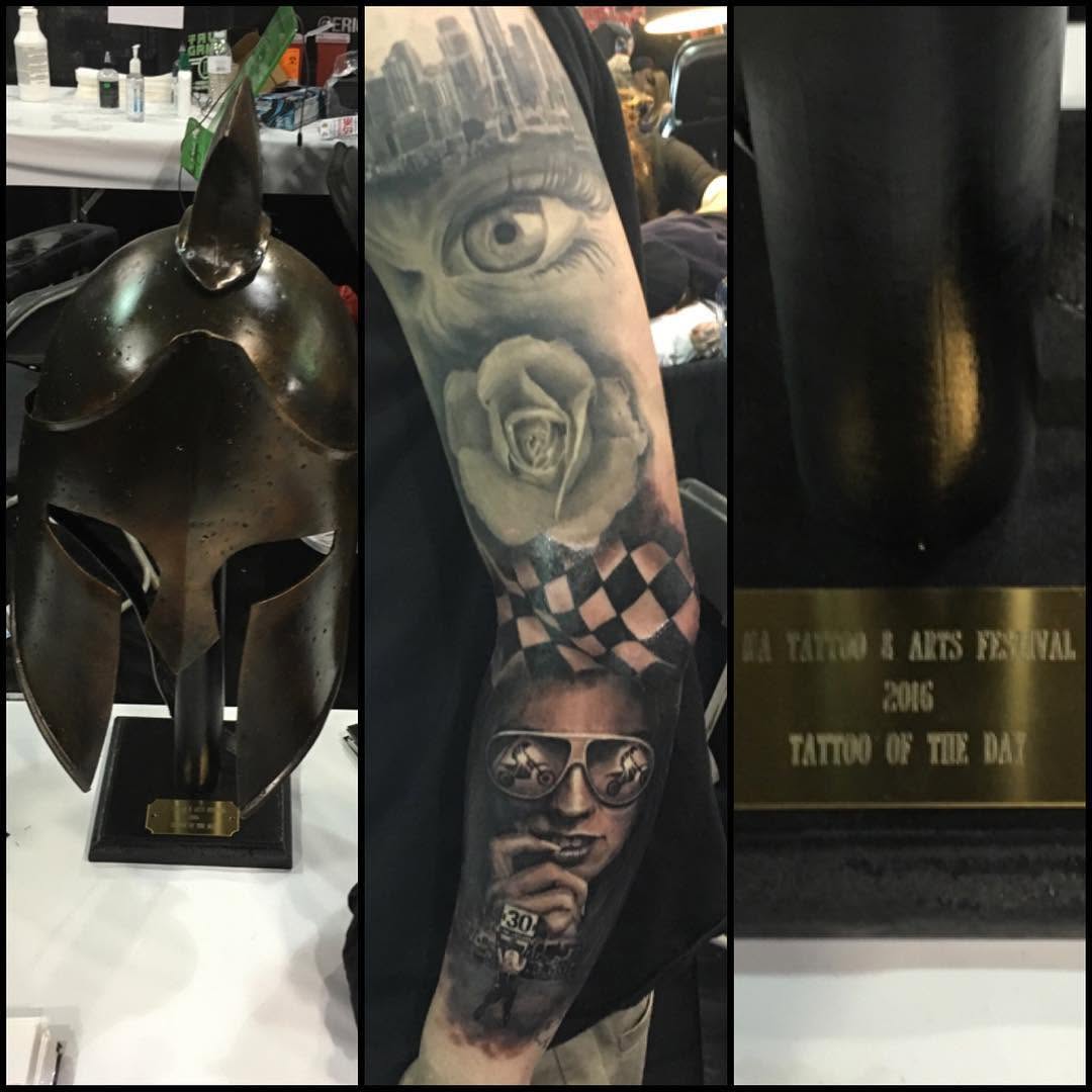 Black-and-grey realism forearm sleeve, award-winning