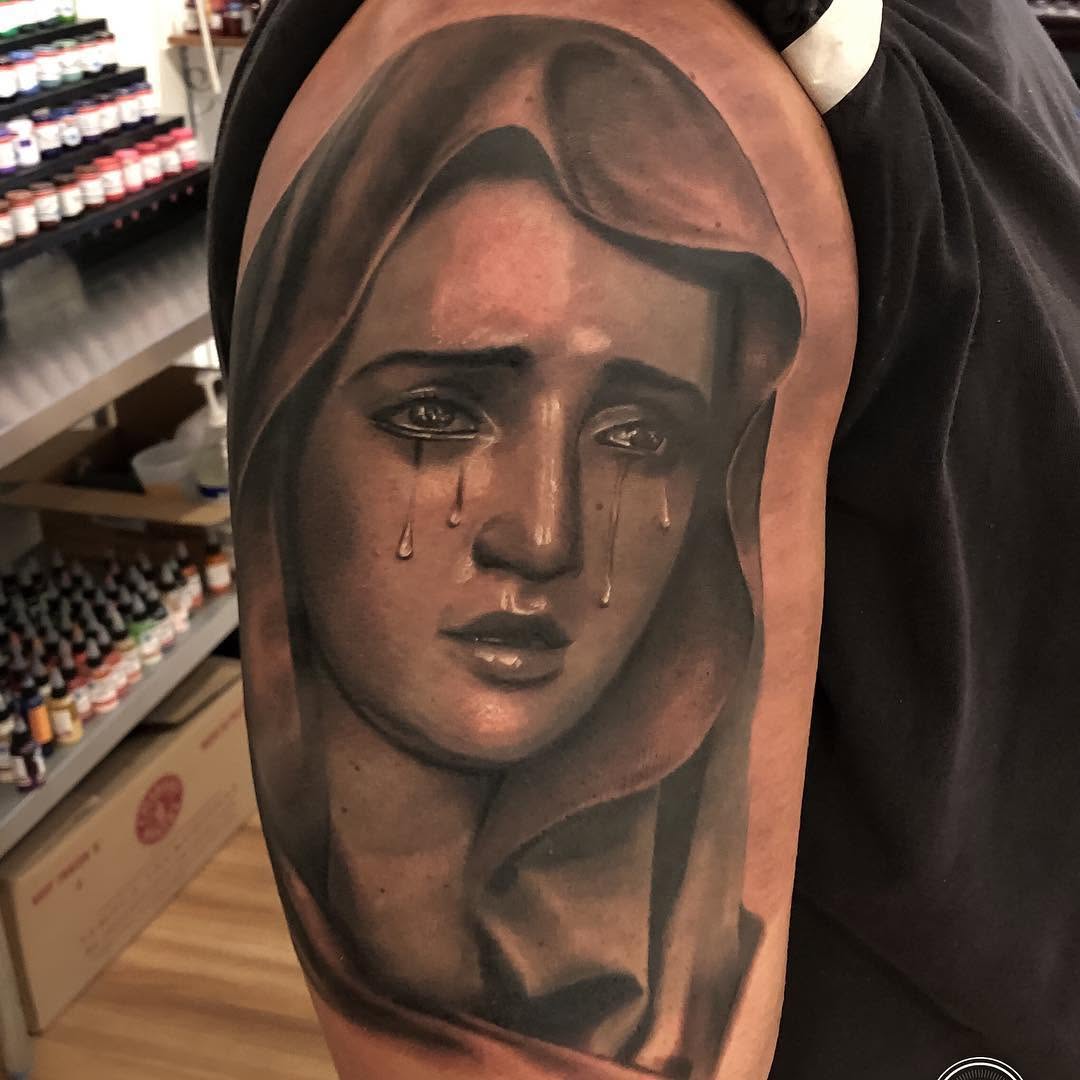 Black-and-grey Virgin Mary portrait, upper arm