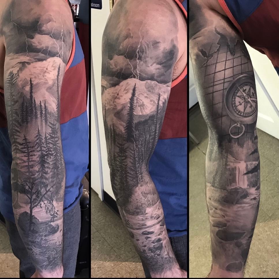 Black-and-grey nature sleeve with compass