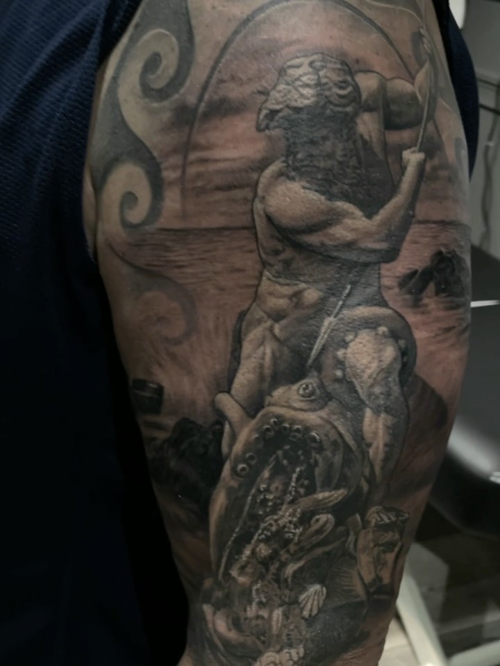 Neptune realism tattoo, black-and-grey half-sleeve