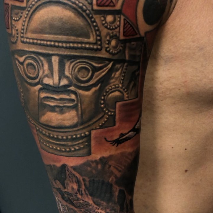 Tumi mask & Machu Picchu sleeve, arm