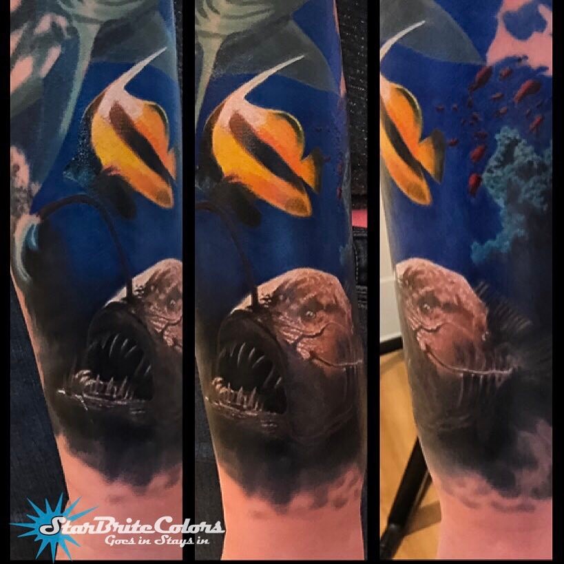 Underwater sleeve with anglerfish and tropical fish