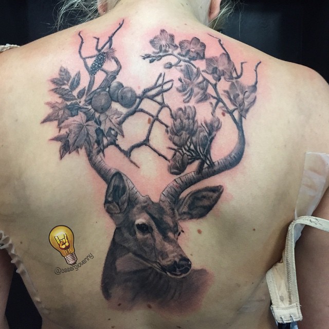 Black-and-grey deer with floral antlers, back