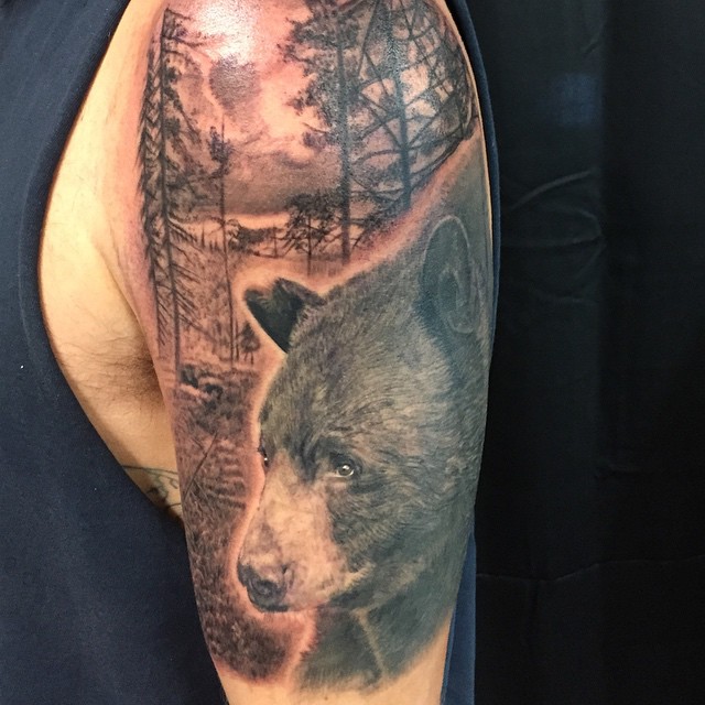 Black-and-grey bear and forest half-sleeve