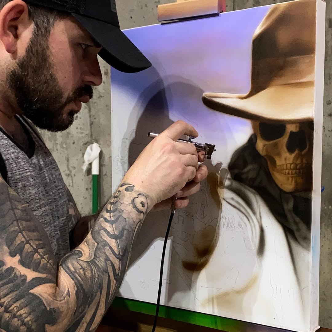 Airbrush painting of skeleton cowboy in progress