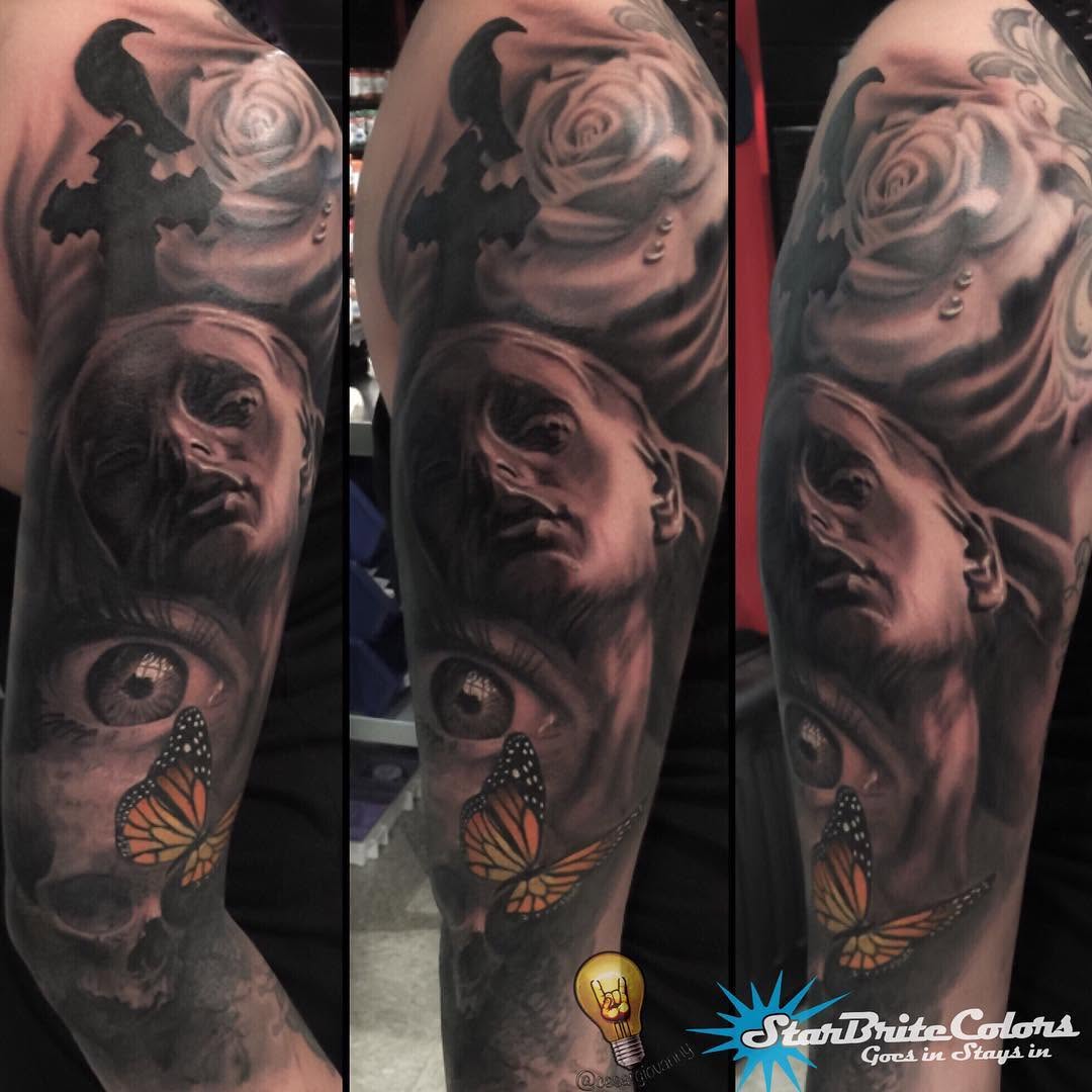 Black-and-grey realism sleeve with butterfly