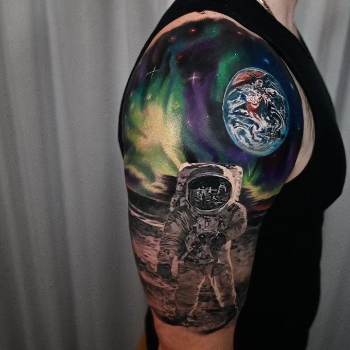 Astronaut and Earth space scene half sleeve