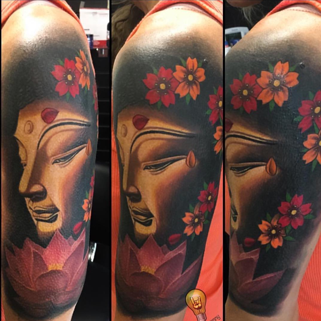 Color Buddha and lotus tattoo, bicep