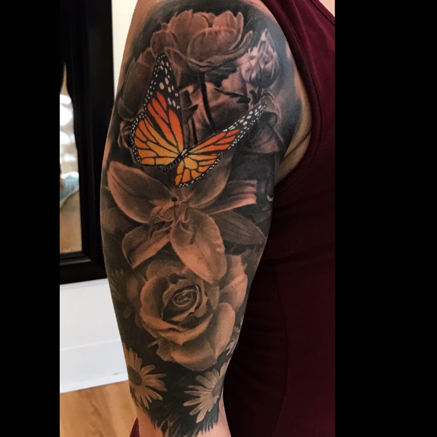 Got to finish this little black and grey floral half sleeve…