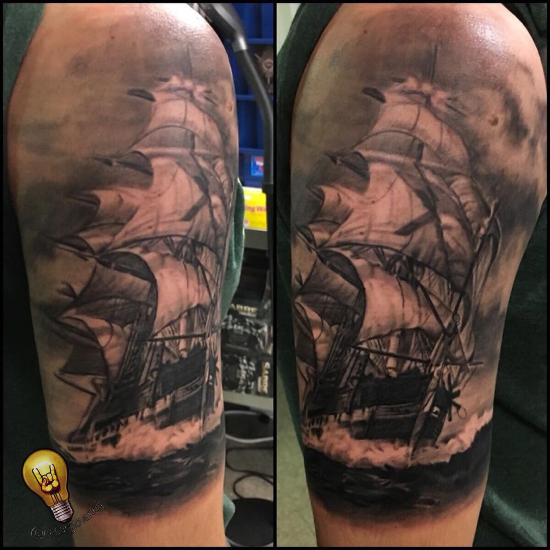 Black-and-grey tall ship tattoo, half sleeve
