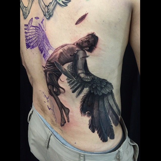 Black-and-grey Icarus falling, ribs