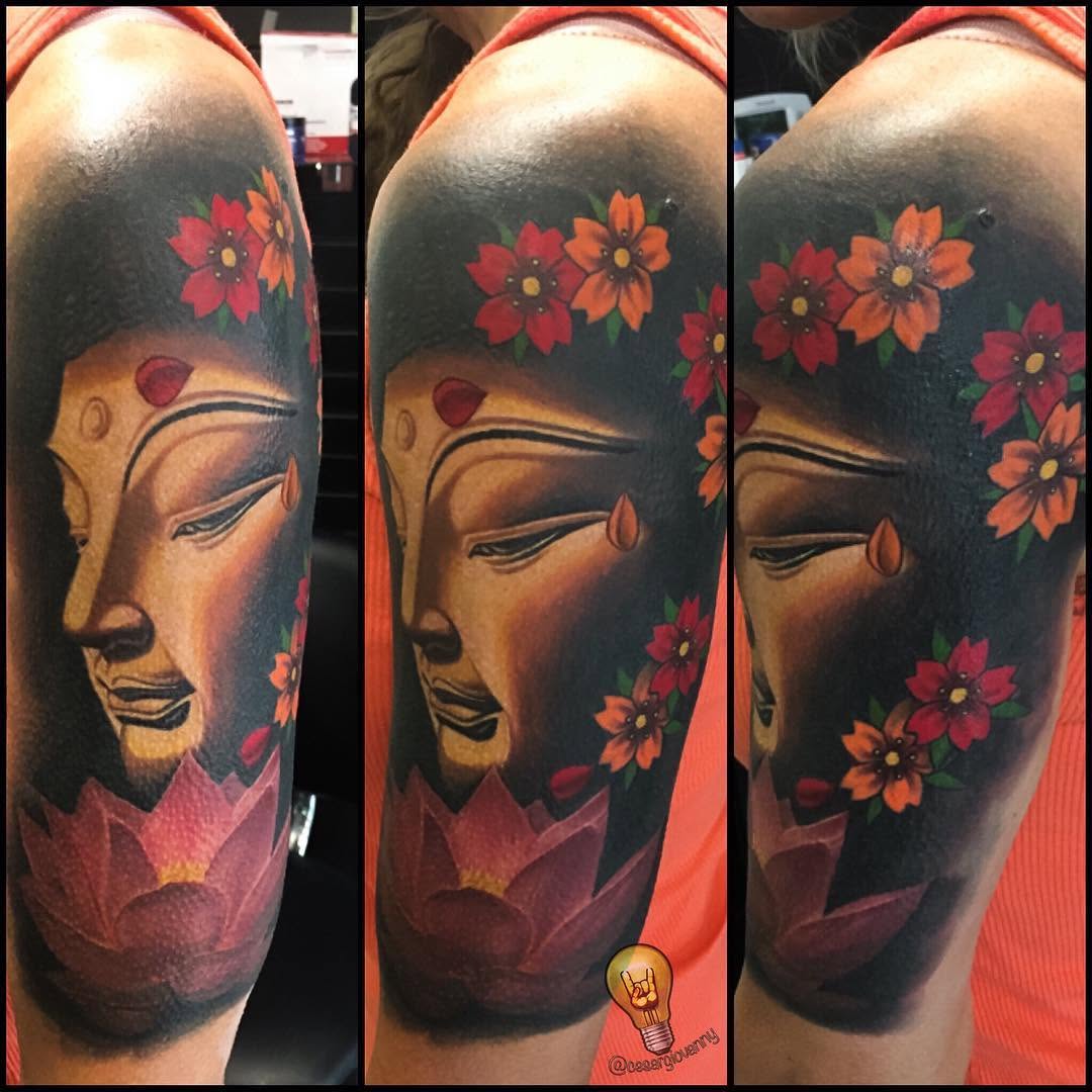 Color Buddha and lotus half-sleeve tattoo