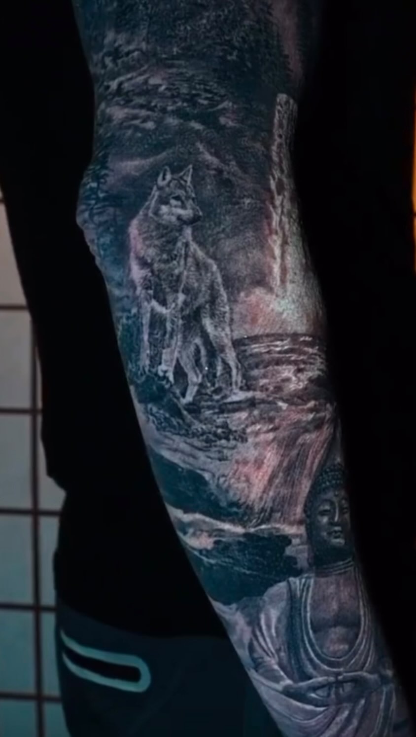 Black-and-grey nature sleeve with wolf and Buddha