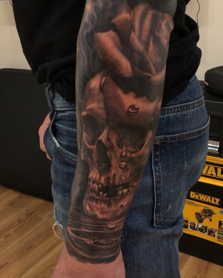 Black-and-grey horned skull and rose sleeve