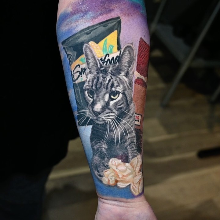 Realistic cat portrait with Smartfood, forearm