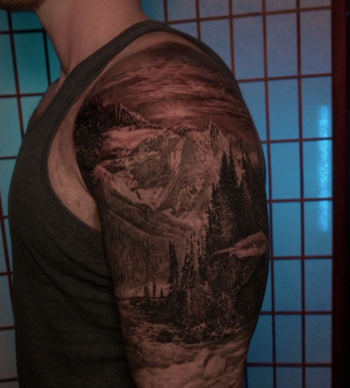 Black-and-grey mountain nature scene, half sleeve
